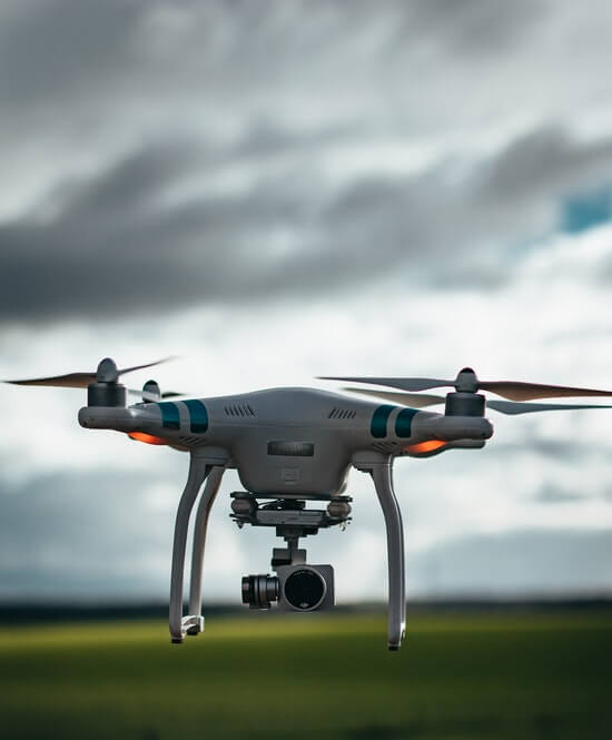 These are some drone phots that are hovering in the air and 1st one is set on the table.